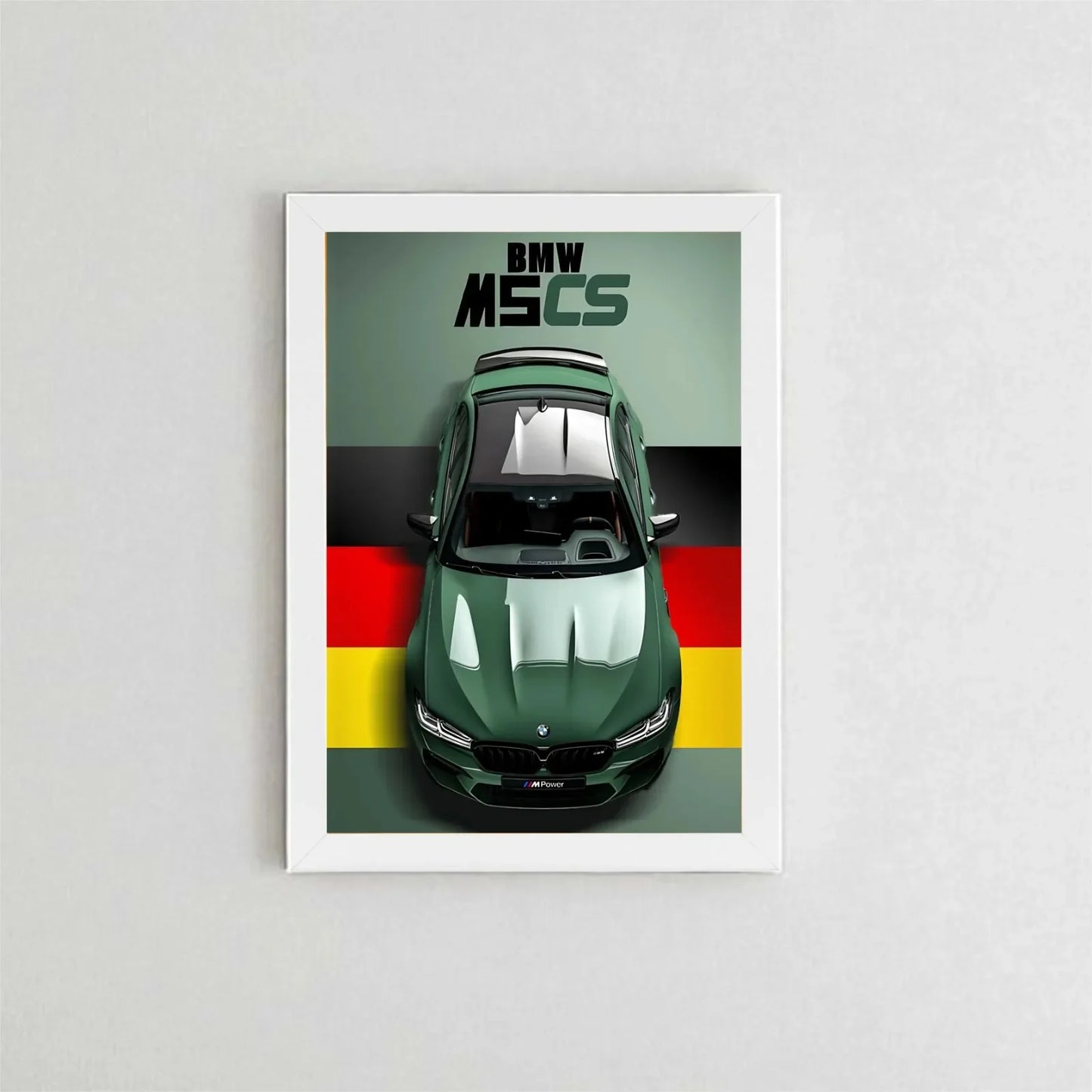 Framed poster of a green BMW car with German flag design on a gray wall