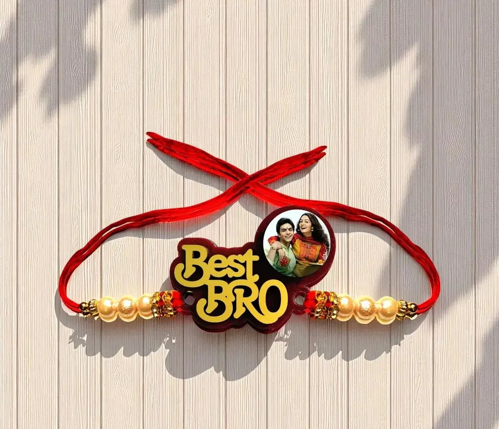 laser-cut wood rakhi with red thread and photo for brother