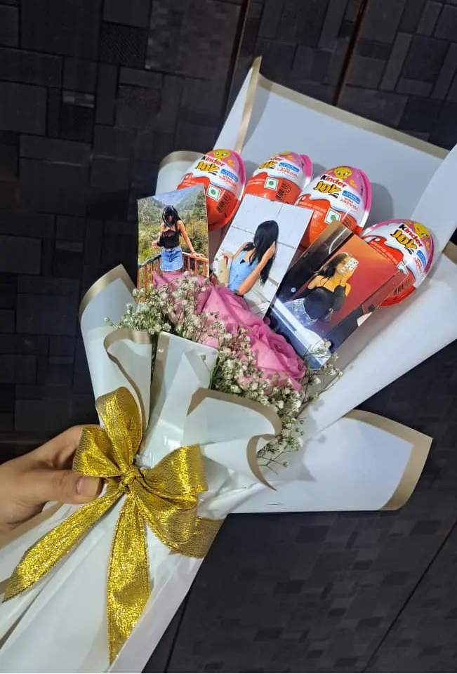 Customized Kinder Joy bouquet with pink roses and custom photos wrapped in premium white paper