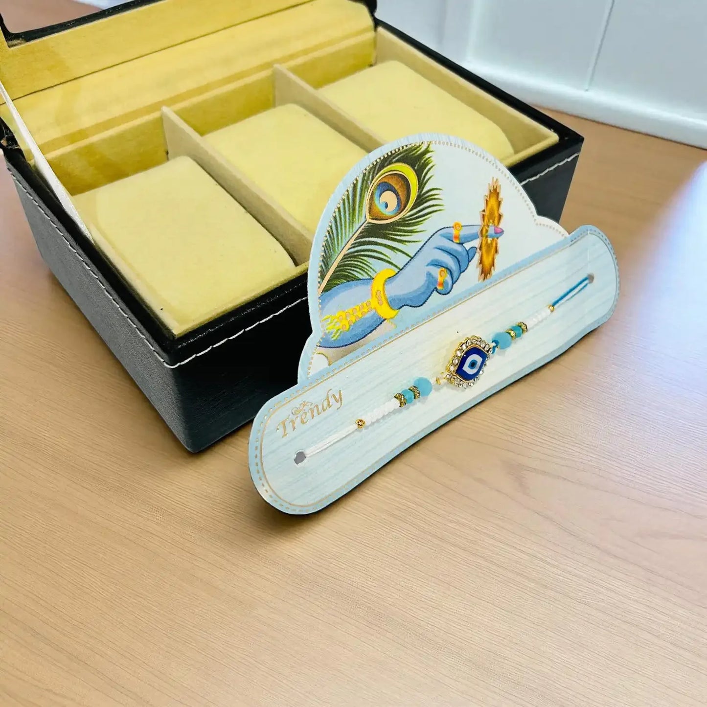 Open best brother watch box with blue evil eye rakhi for Raksha Bandhan