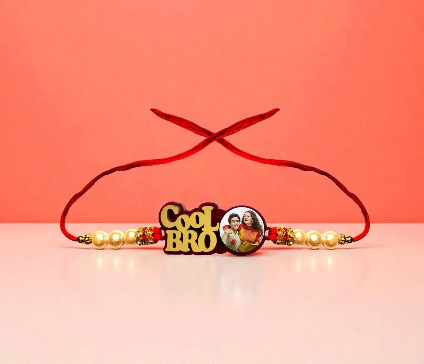 Personalized rakhi for brother with “Cool Bro” design and pearl detailing