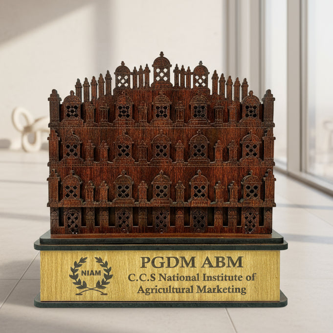 Wooden architectural model on a stand with 'PGDM ABM' and 'C.C.S National Institute of Agricultural Marketing' branding.