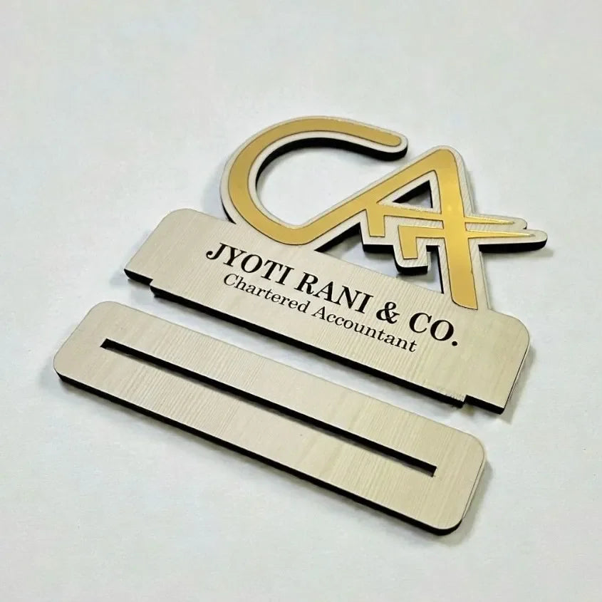 Gold nameplate with 'Jyoti Rani & Co.' and 'Chartered Accountant' text on a white background