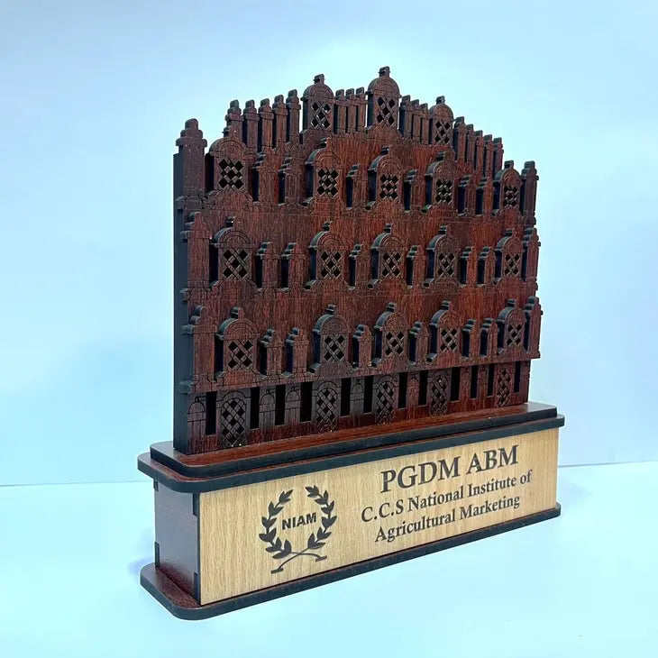 Wooden architectural model with 'PGDM ABM' and 'C.C.