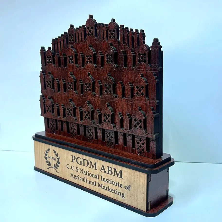 Wooden architectural model with 'PGDM ABM' and 'C.C.