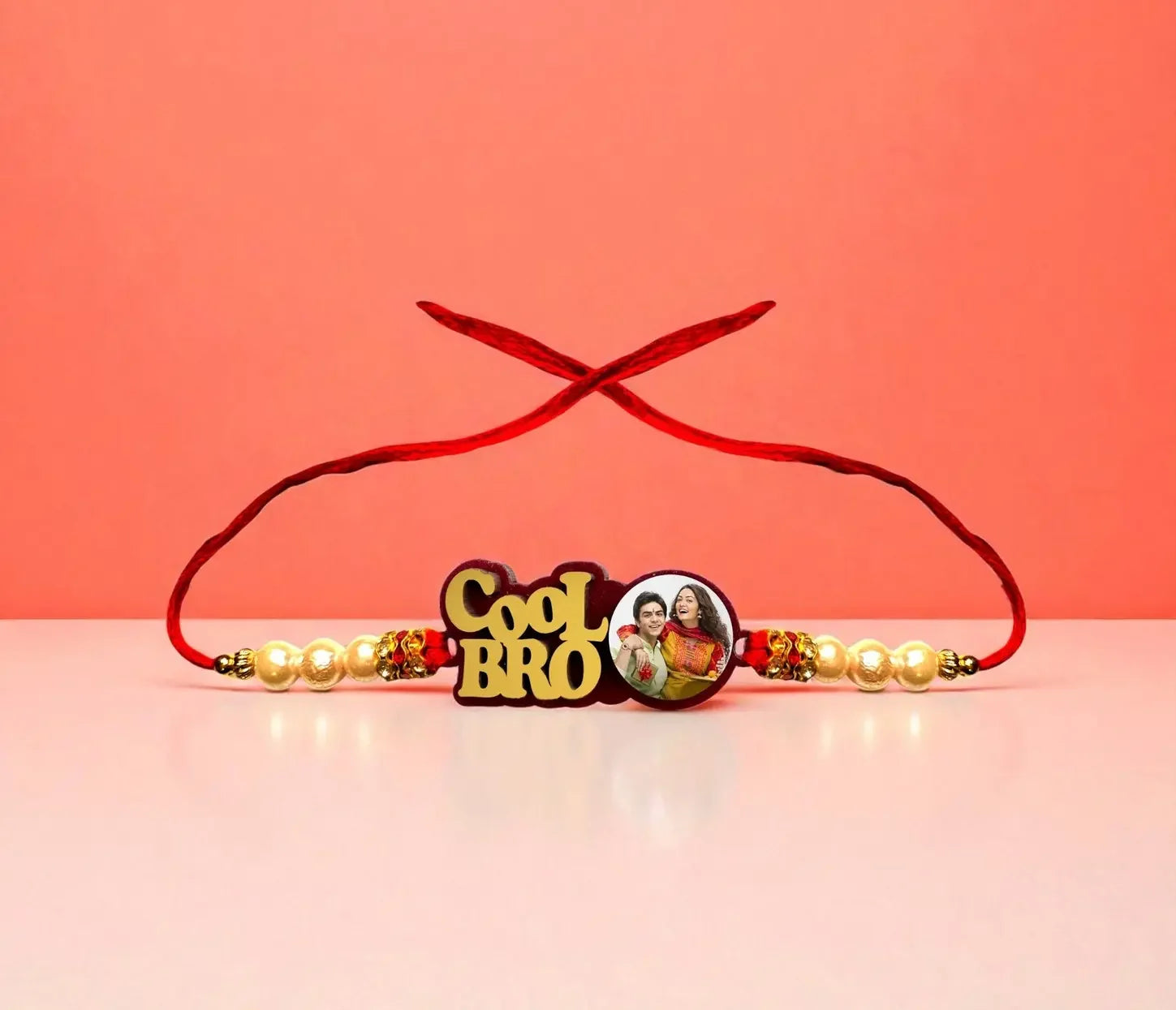 Personalized rakhi for brother with “Cool Bro” design and pearl detailing