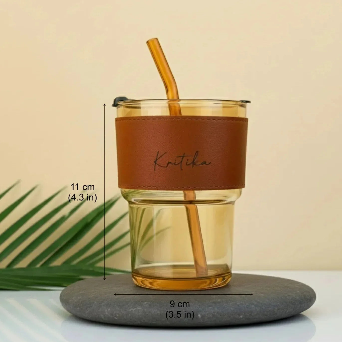 Custom glass cup with leather sleeve and straw
