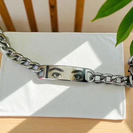 Custom engraved bracelet with eyes on a steel chain – personalized jewelry gift.