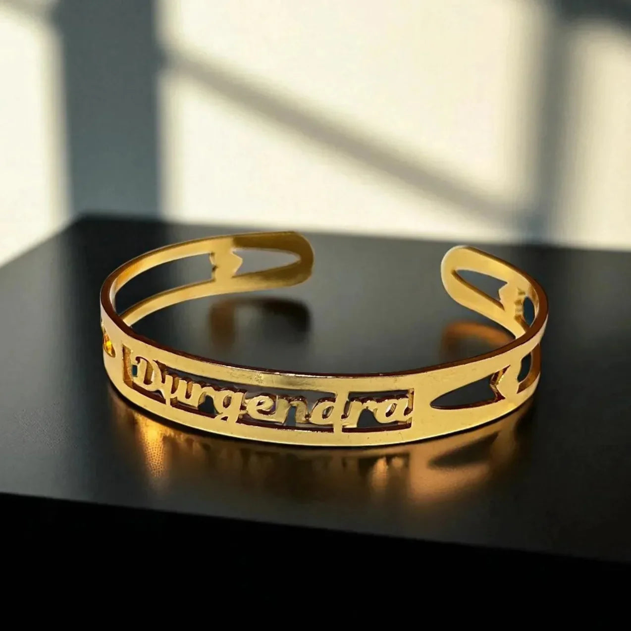 Unisex gold name bracelet gift with open cuff design
